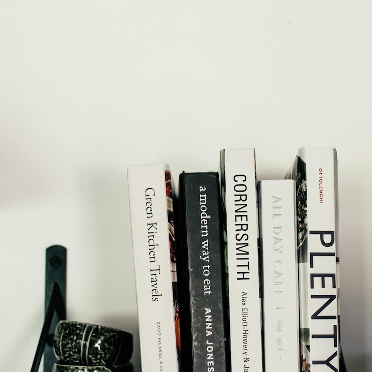 Stock image of cookbooks on a shelf
