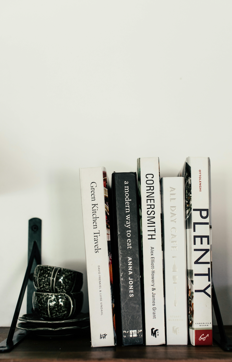 Stock image of cookbooks on a shelf